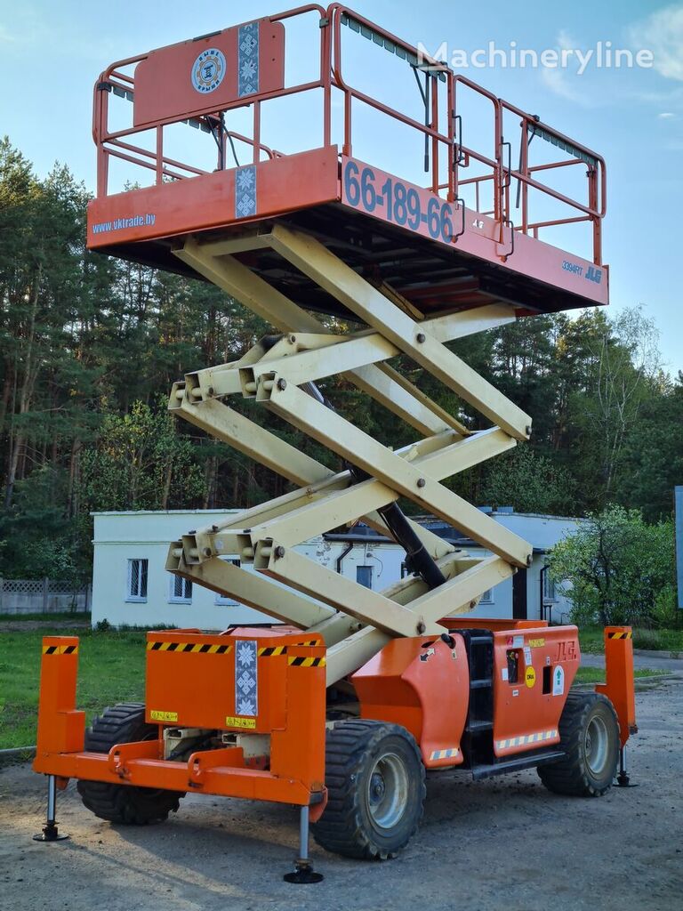 ножична работна платформа JLG 3394 RT.  12,5 метров